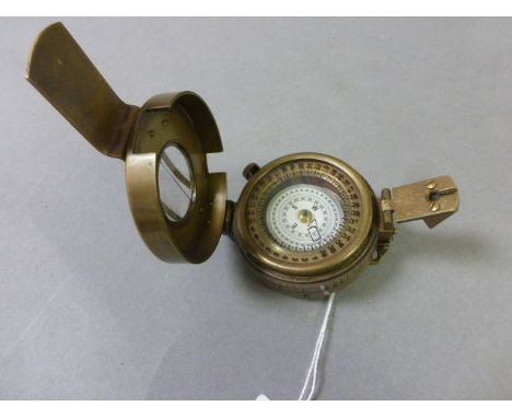 Brass compass stamped TG Co London 1940