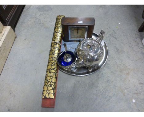 A Art Deco mantel clock, along with silver plated teapot and other items 