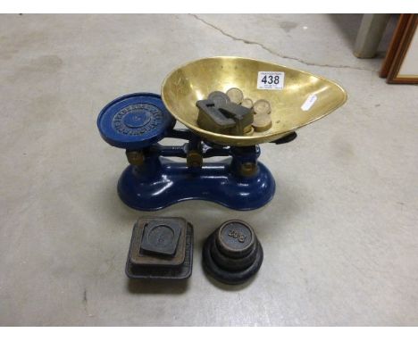 A set weighing scales and weights 