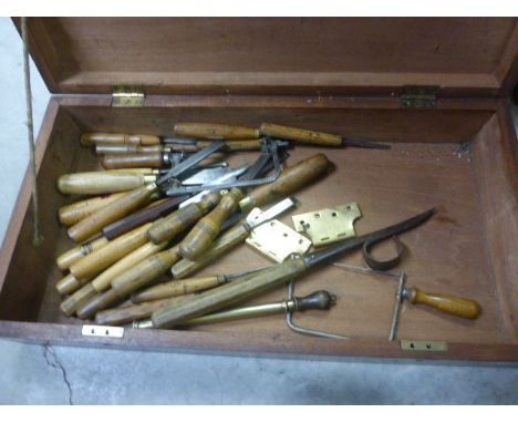 Flat mahogany tool box with vintage tools, mainly chisels to include; Marples