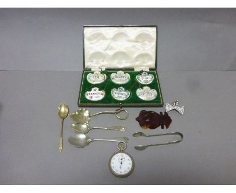 A cased set of ceramic drinks labels by T.Goode, London, along with various other items 