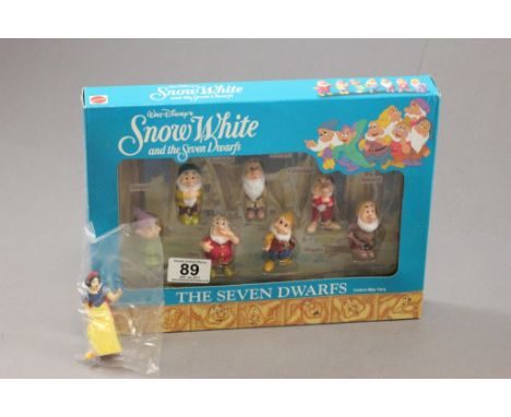 Boxed Mattel ' Walt Disney's Snow White and the Seven Dwarfs ' of The Seven Dwarfs with separate Snow White figure