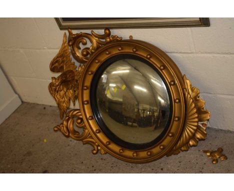 A large Georgian style convex porthole mirror with eagle mount