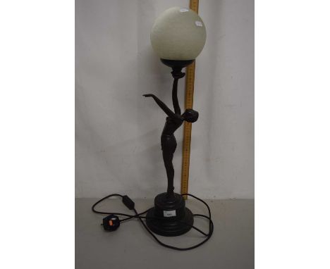 Reproduction bronzed composition table lamp with figural base and globe shade in the Art Deco style