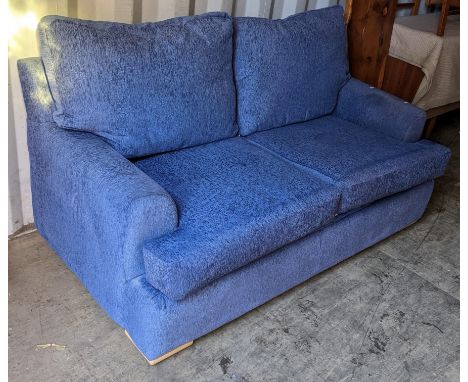 A modern blue upholstered sofa bed 94cm h x 168cm w Location: 