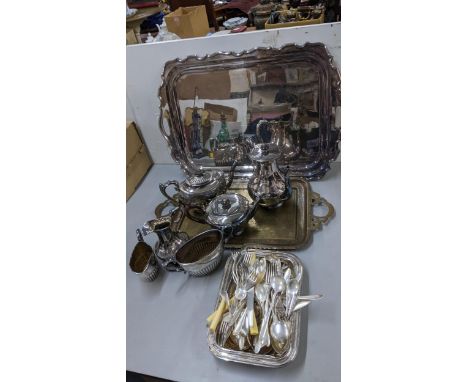 Silver plate to include a Walker &amp; Hall tray, a tea set, flatware tableware, a brass tray and entire dish 