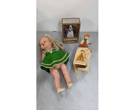 Mixed toys to include a 1930's/40's radio speaker doll, a Marcel Marceau musical box together with a mechanical wind-up tin t