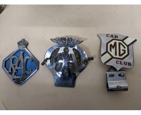 A group of three vintage car radiator grill badges to include an MG Club badge, RAC badge, and an AA badge Location: 