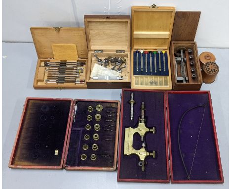 A selection of watchmakers tools to include Savoy screwdriver set, 'tour a pivoter' tool and other itemsLocation: 