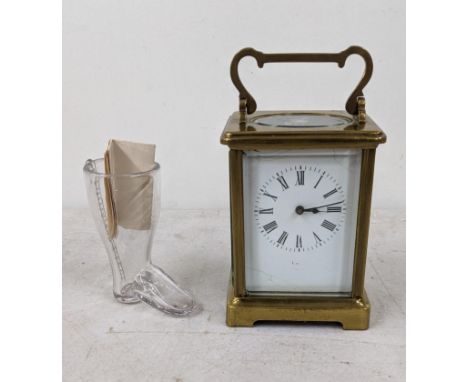 An early 20th century carriage clock A/F, together with an Edwardian glass gin vessel in the form of a boatLocation: 