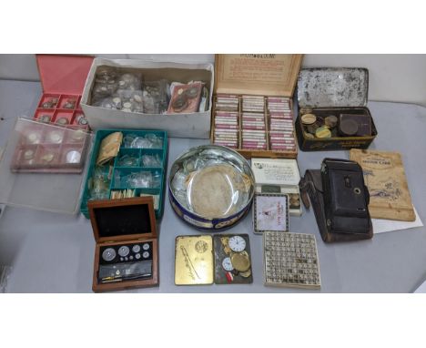 A mixed lot to include watch glasses, mainsprings, apothecary scales whale small lightbulbs, Voigtlander camera and other ite