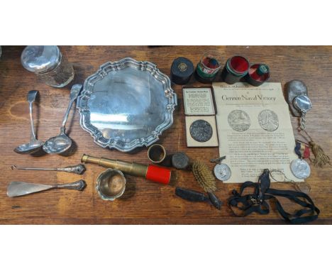 A mixed lot to include silver plated food tray ladles and others along with a boxed Lusitania Medal, Peace 1919 Rhodesia Meda