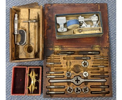A collection of watchmakers tools to include a Depthing compass, precision lathe and other itemsLocation: 