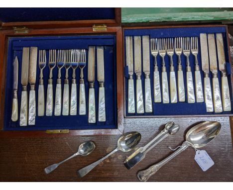 A group of silver and silver plated flatware to include a Georgian Kings pattern tablespoon, two other Georgian spoons, and G