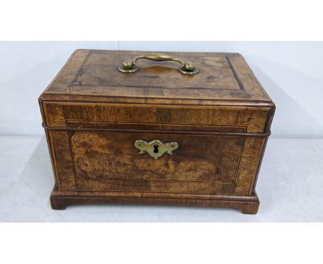 A Victorian mahogany tea caddy having boxwood string inlaid and fitted interiorLocation: 