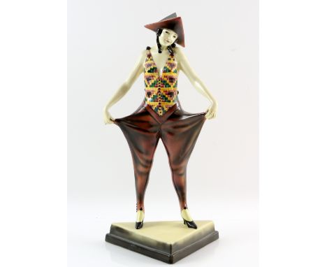 UPDATED CONDITION Goldscheider earthenware figure, designed by Stephan Dakon, of a young woman in carnival costume, circa 193