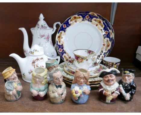 A collection of Royal Albert, Royal Crown Derby and Royal Doulton; seven The Doultonville collection characters, a collection