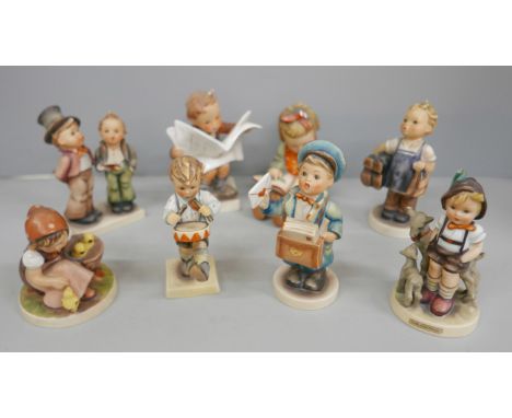 Eight Hummel figures including Boy Reading Newspaper and Little Goat Herder (a/f) 