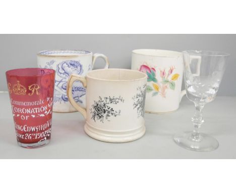 Three 19th century ceramic mugs, transfer printed decoration, (diamond jubilee mug with hairline crack) a cranberry beaker, '
