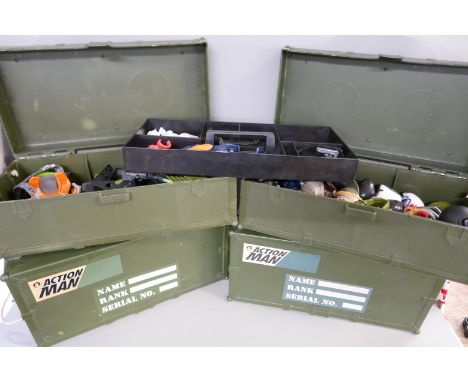 A large collection of modern Action Man accessories, clothes, weapons, boots and four ammunition cases with other accessories