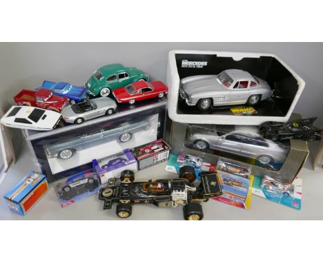 A collection of die-cast cars including a John Player Special racing car, Mercedes, VW Beetle, Matchbox, Corgi and Siku minia