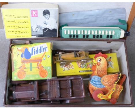 A Pelham puppet, JC Father, boxed, two wooden model classic cars, a treble recorder, two pull-along toys, hen and Fiddler the