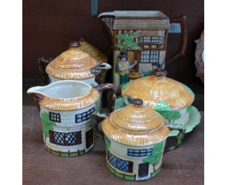 A Beswick Cottage ware tea service and cheese dish and a Falcon Ware Toby and Sam Weller jug (6)