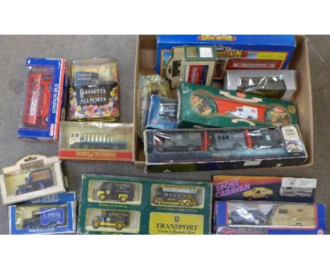 A collection of model vehicles including Corgi Great Britain, Lledo Home Front, London Bus, etc., all boxed