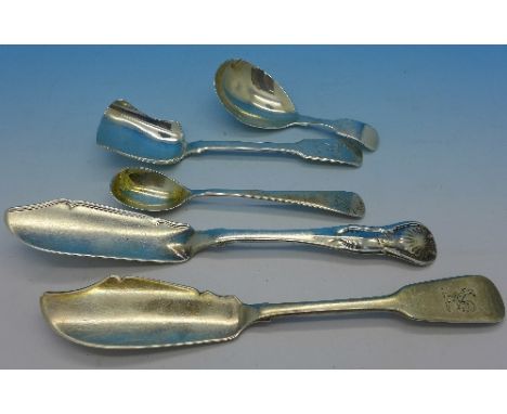 Two Victorian silver caddy spoons, one by George Adams, one by George Unite, a Georgian silver preserve spoon, an Irish silve