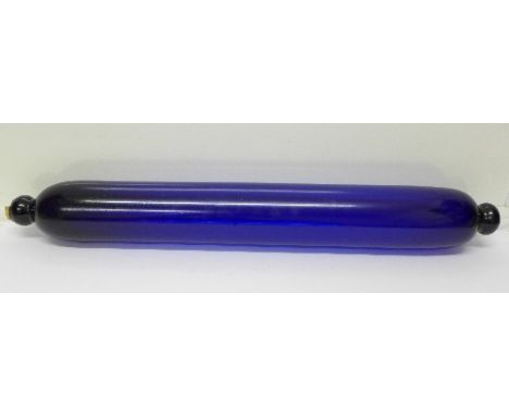 A large Bristol blue glass rolling pin, 64cm