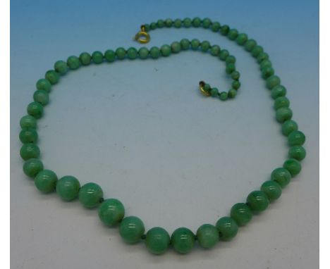 A jade bead necklace