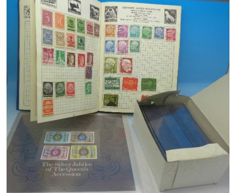 An album of stamps, a 1977 Silver Jubilee First Day Issue and stamp folders