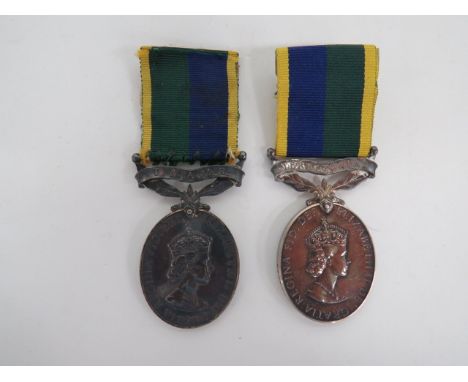 Two Queen Elizabeth II Efficiency Medalsconsisting Elizabeth II with bar “T & AVR” named to “22916759 Pte T Clube ACC” ... El