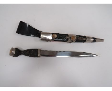 Scots Guards Senior NCO’s Dirk12 inch, single edge, plain blade with sharpened back edge point.  The back edge with scallop c