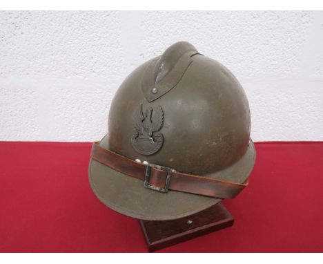 WW2 French Pattern Polish Forces Steel Helmetgreen painted, one piece constructed crown and brim.  Applied top comb.  Front w