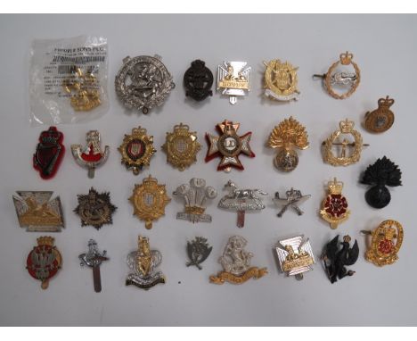 Selection of Post 1953 Badgesincluding bi-metal West Riding ... QC bi-metal Royal Reg of Fusiliers ... QC bi-metal Royal Logi