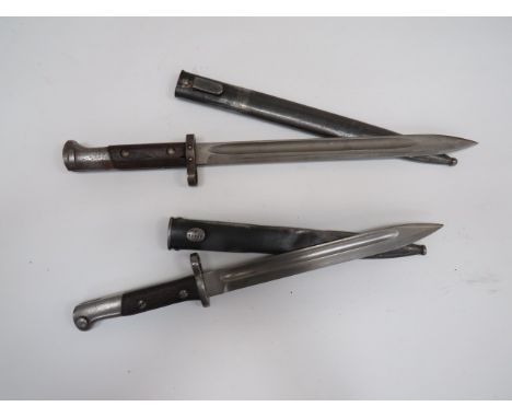 Two Contract Mauser Bayonetsconsisting Czech M1924 example.  11 3/4 inch single edged blade.  Steel muzzle ring, crossguard a