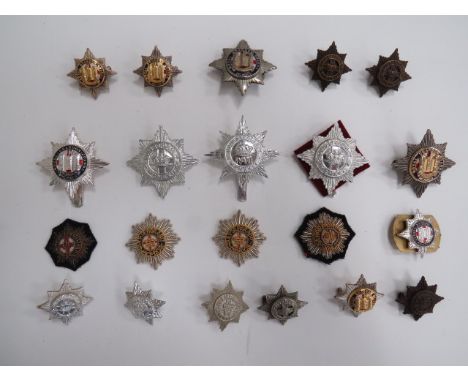Selection of Various Cavalry Badgescap badges include anodised 4/7 Hussars ... Plated, gilt and enamel Royal Dragoon Guards .