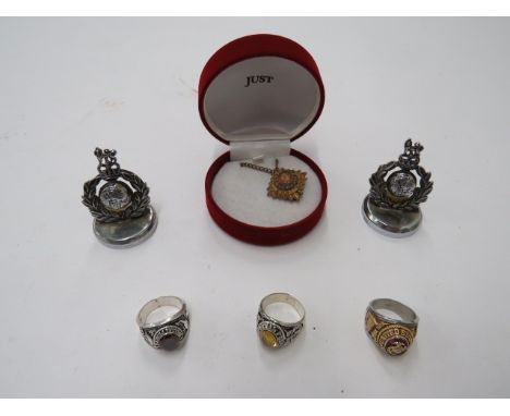 Three Current American US Forces Ringsconsisting cast silver ring with helicopter and parachute decoration with central red s