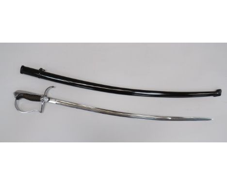 East German Officer’s Dress Sword29 3/4 inch, single edged, slightly curved blade.  Central fuller.  Nickel plated stirrup kn