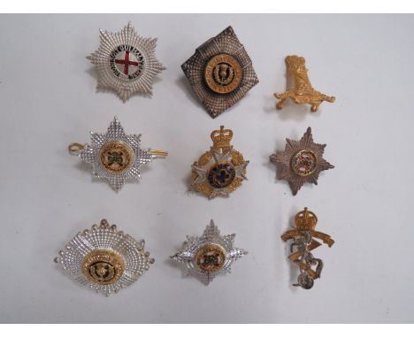 Small Selection of Post 1953 Officer Cap Badgesconsisting gilt 11th Hussars ... QC silvered, gilt and enamel RACd ... Silvere