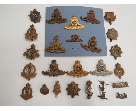 Selection of Corps Cap Badgesincluding KC brass Royal Military Police ... KC bi-metal Malta Artillery ... KC brass West Ridin