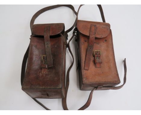 Two Leather Madsen MG Magazine Bucketsbrown curved, stiffened leather pouches.  Top flap secured by strap and brass buckle.  