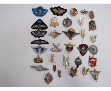 Small Selection of Special Forces Badgesincluding anodised SAS ... KC white metal AAC (brooched) ... Brass Reconnaissance Cor