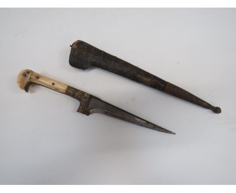 19th Century Indian Kard Dagger6 inch, single edged T section watered blade.  Floral engraved, white metal ferrule and grip s