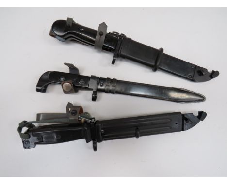 Three Various Communist AK Bayonetsconsisting AK47.  Single edged blade with central fuller.  Blackened muzzle ring and ring 