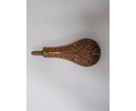 Large Copper and Brass Powder Flask7 1/4 inch, brass, bag shape body with embossed floral design.  Brass top with long adjust