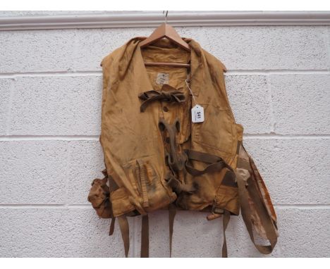 1941 Pattern RAF Mae Westyellow drill material vest.  Tan canvas light pocket to the right side.  Left chest mirror pocket.  