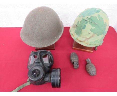 Small Selection of Helmetsconsisting American rear seam steel helmet.  Camo cover.  Complete with fibre liner shell with webb