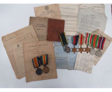 WW1/WW2 Family Medal Group and Paperworkconsisting silver War medal and Victory named to “49545 Pte E Smith S Staff R” ... 19